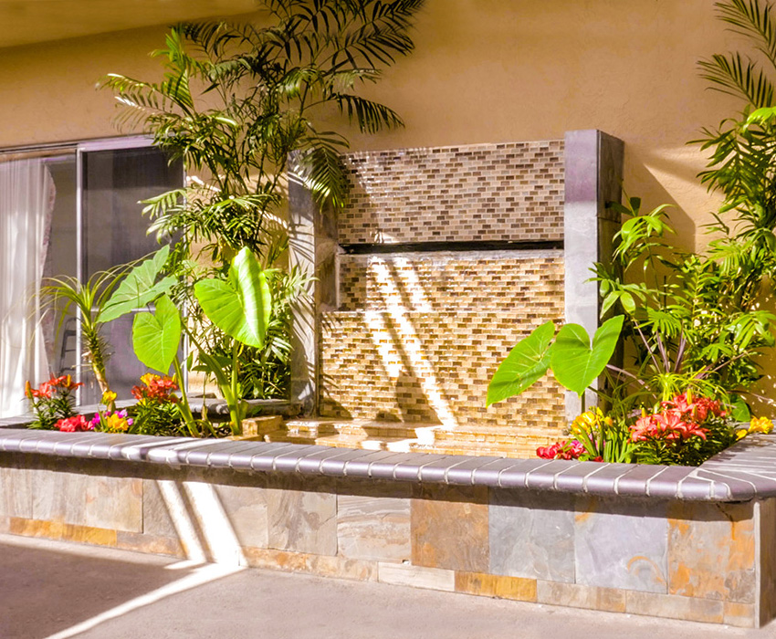 wall fountain in front of the Huntington Park facility